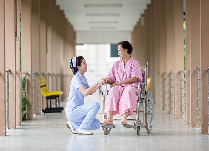 Image of a nurse and elderly woman